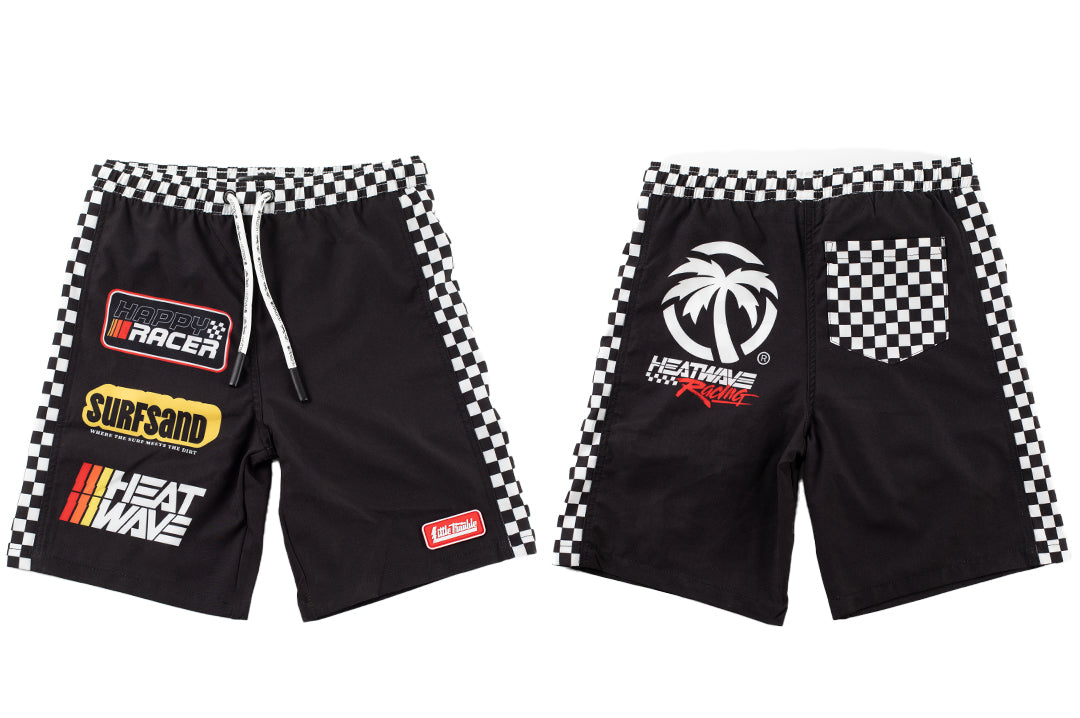 Front and backside of the Little Trouble X Heat Wave Kids Board Shorts on a white background.