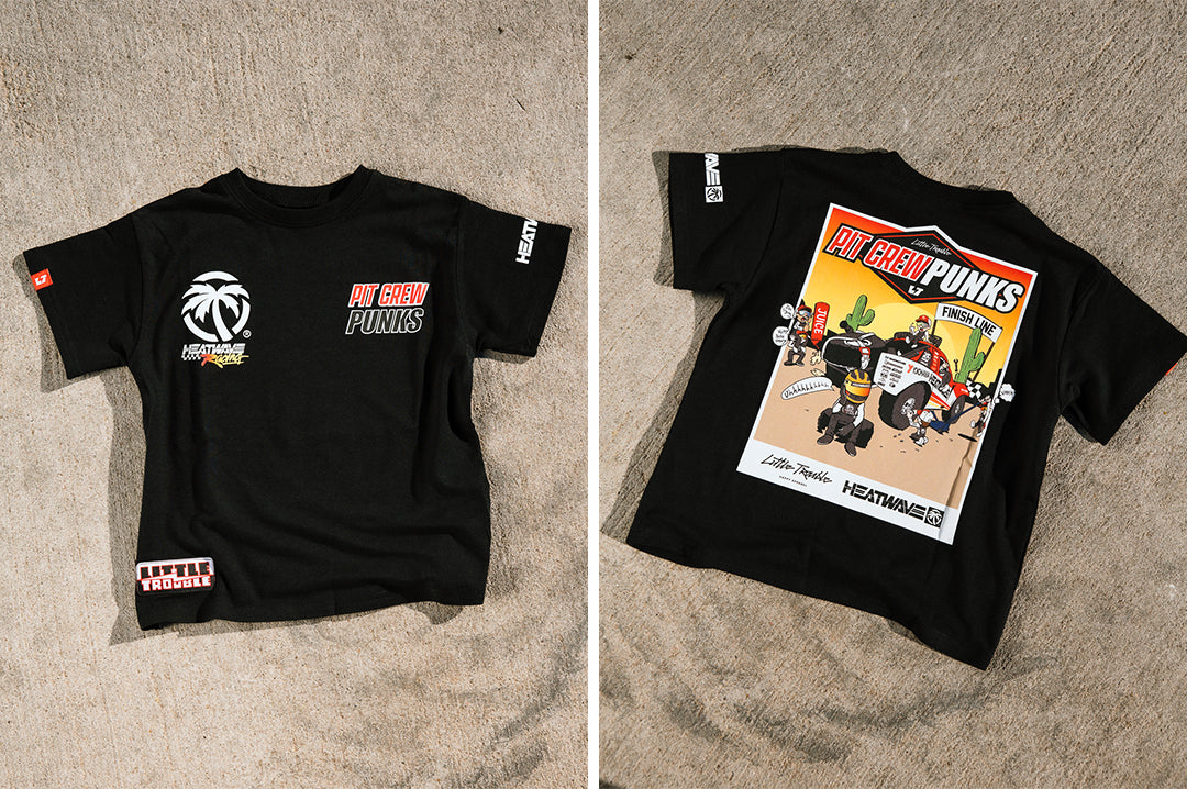 Front and backside of the Little Trouble X Heat Wave Kids T-Shirt on a concrete floor.