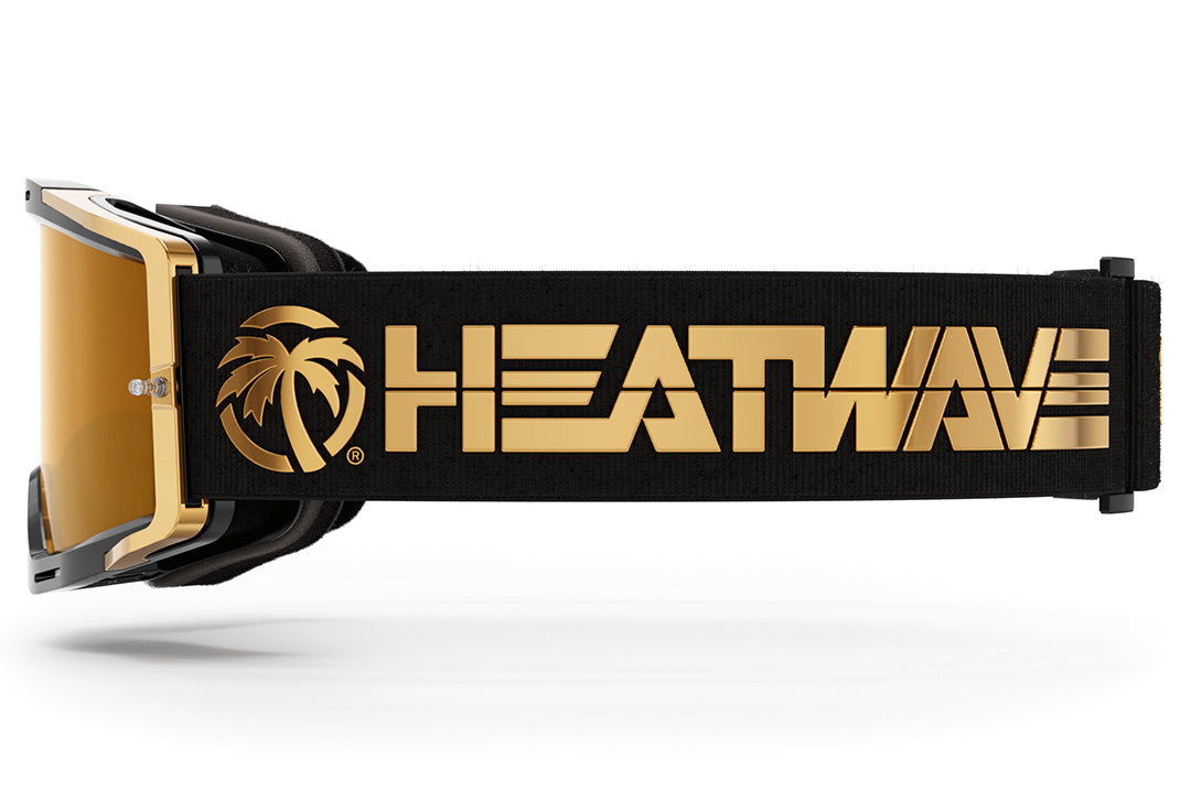 Side view of the Heat Wave Visual MXG 250 Motorsport Goggles in the Colby Raha black/gold color with gold rush lens.