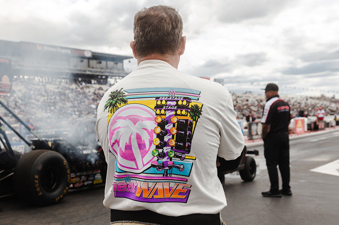 Man wearing the Heat Wave Timing Tree T-Shirt