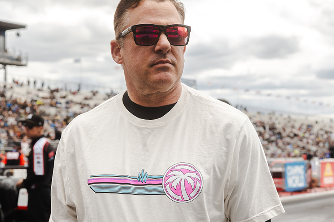 Man wearing the Heat Wave Timing Tree T-Shirt