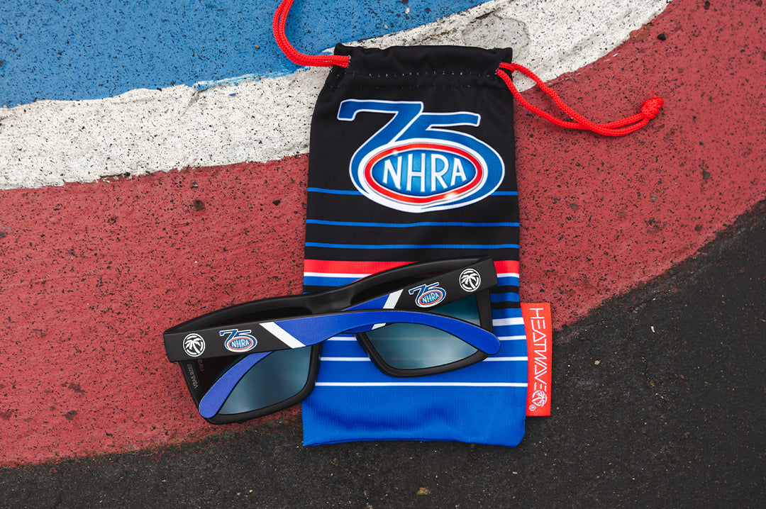 The VISE Sunglasses: NHRA Customs lying on top of carrying bag on the ground