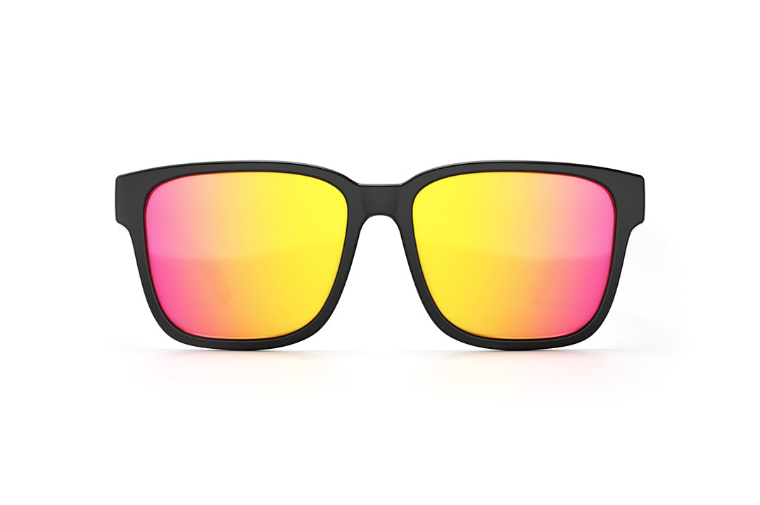 Front of Heat Wave Visual Apollo Sunglasses with black frame, coloful palm tree print arms and tropic pink yellow lens.