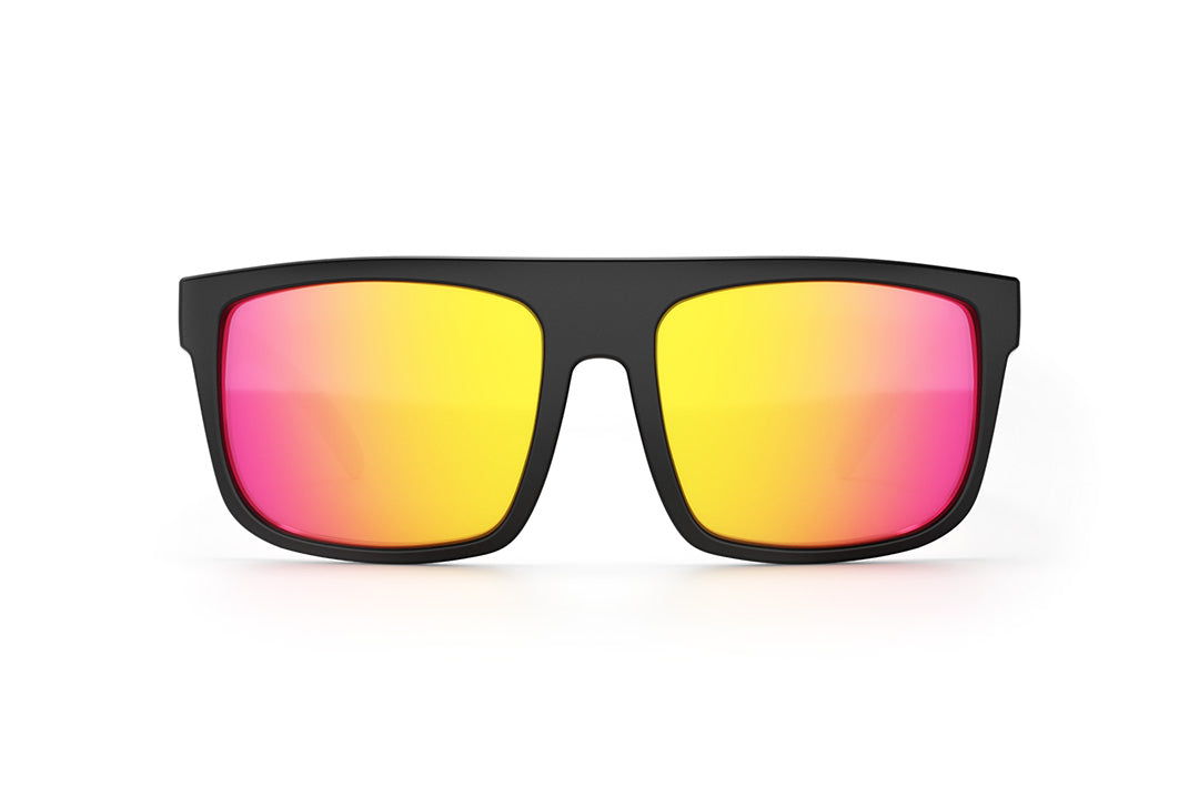 Front of Heat Wave Visual Regulator Sunglasses with black frame with multi color palm tree print arms and tropic pink yellow lenses.