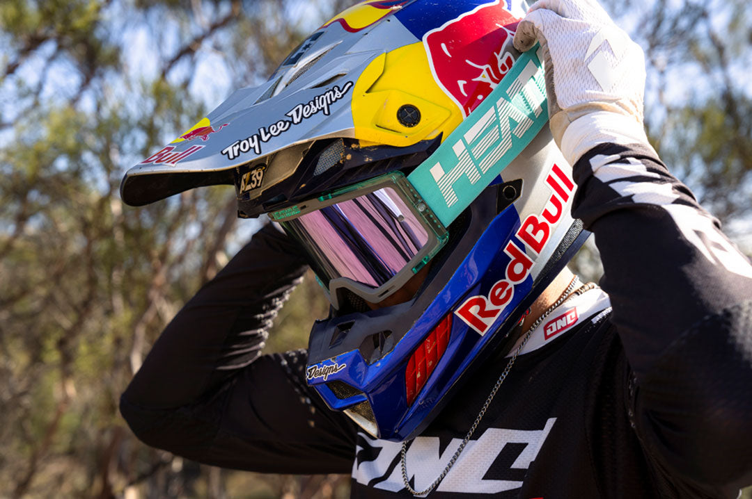male model wearing Heat Wave Hydro Aquastone Goggles with Ultra Violet Lens and Aqua colored strap