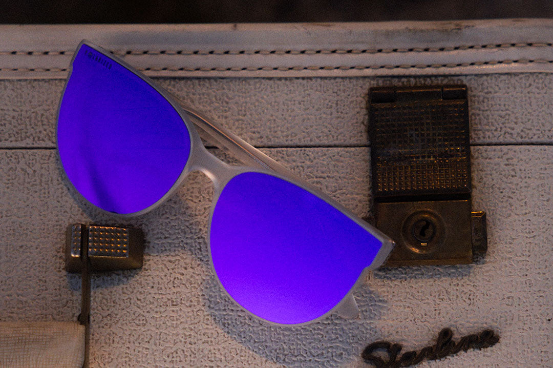 Close up of Heat Wave Carat with Vapor Frost Frame and Purple Lenses