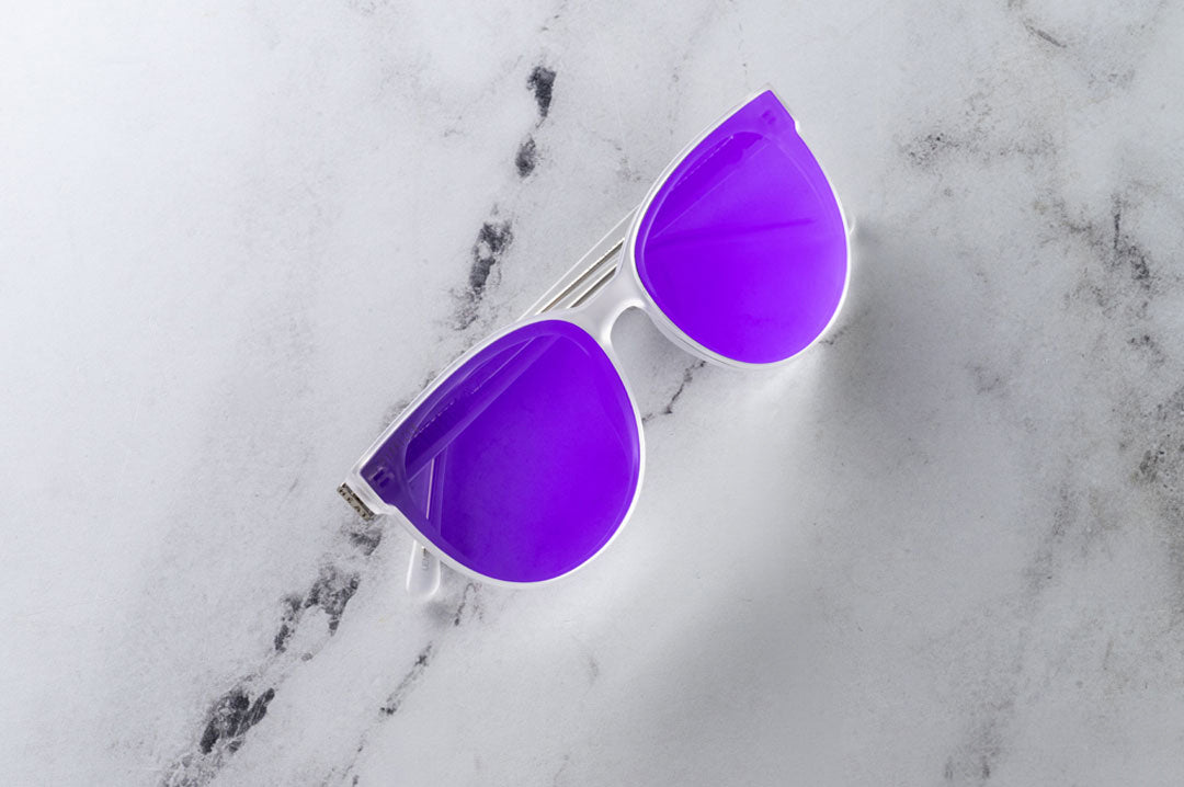 Close up of Heat Wave Carat with Vapor Frost Frame and Purple Lenses