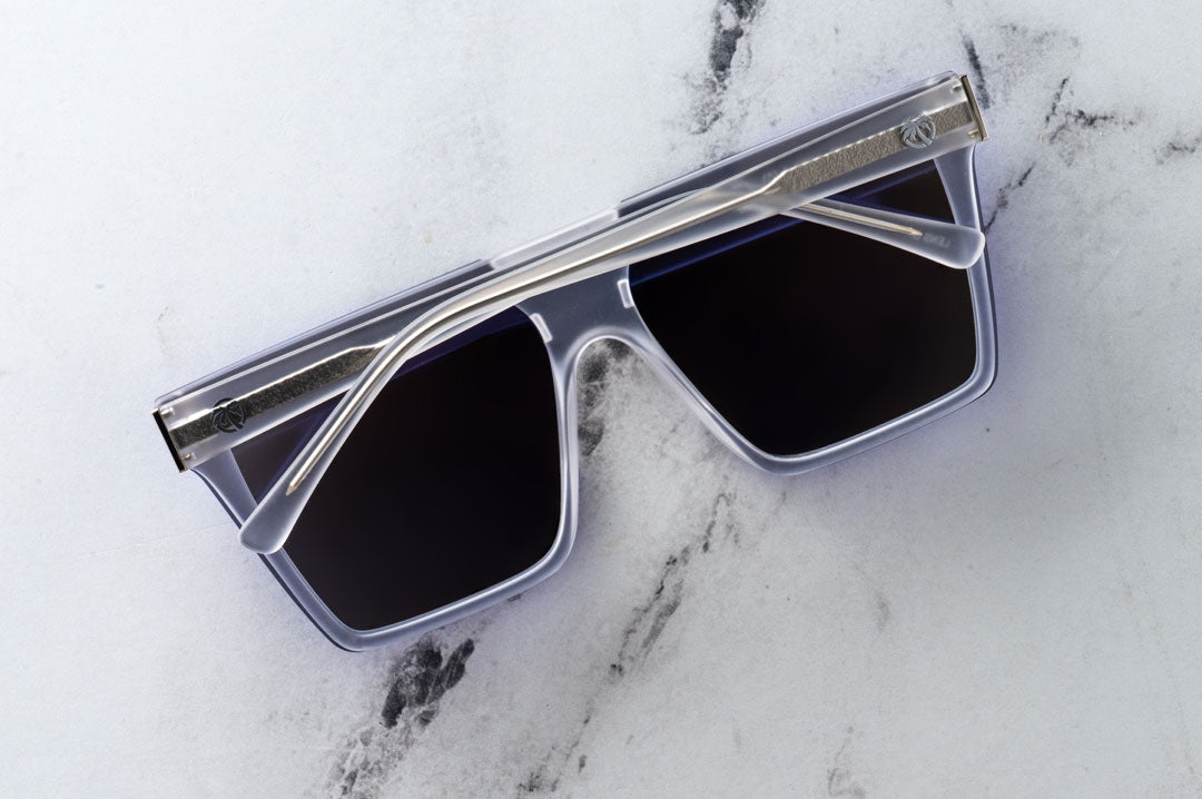 Close up of Heat Wave Clarity with Vapor Frost Frame and Purple Lenses