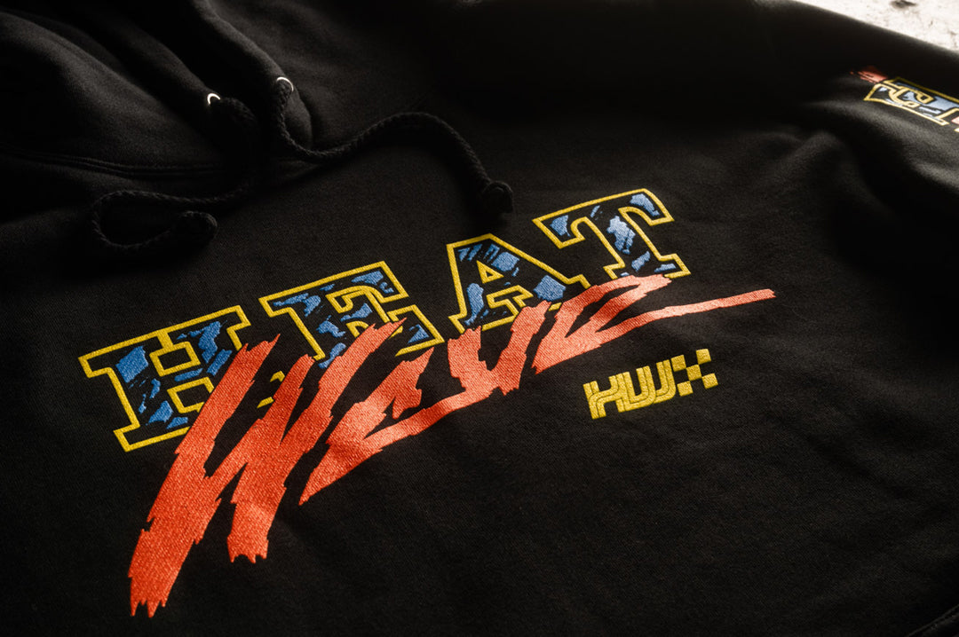 Close up of the Heat Wave Visual Black Magic Sweatshirt.