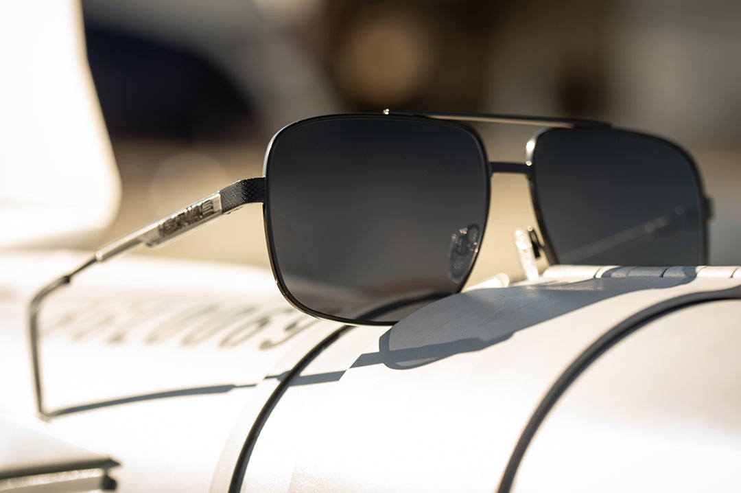 Sitting on top of a rocket is the Heat Wave Visual Nimitz Sunglasses with satin black frame and ultra black lenses.