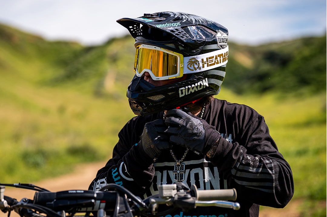 Colby Raha wearing The MXG-250 Moto Goggle - Colby Raha 2.0 with gold lens on a dirt bike