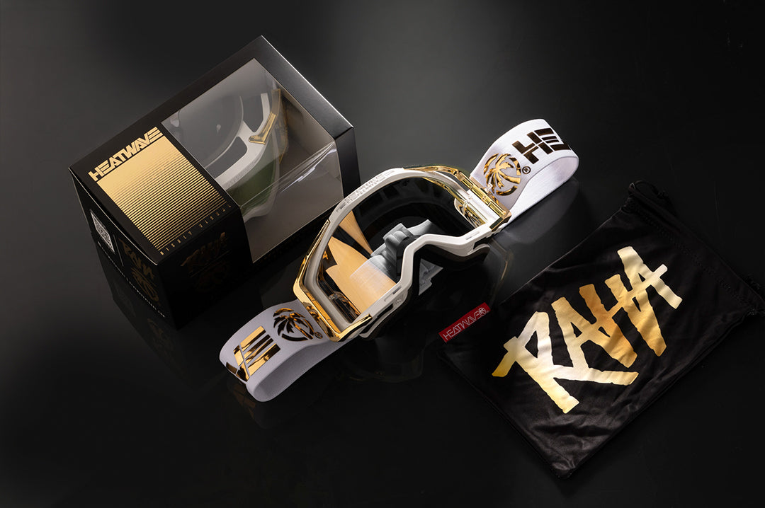 Sutdio shot of the MXG-250 Moto Goggle - Colby Raha 2.0  with carrying bag and product box on a black background