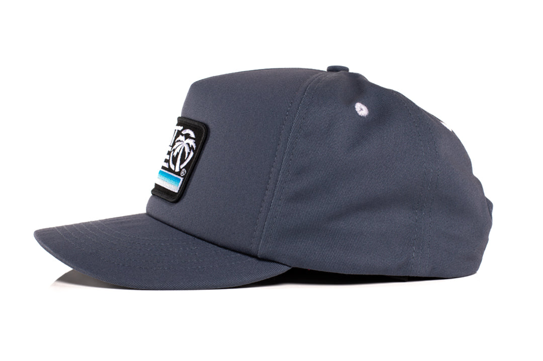 Side view of the Heat Wave Visual Retro Stripe Slate hat. 