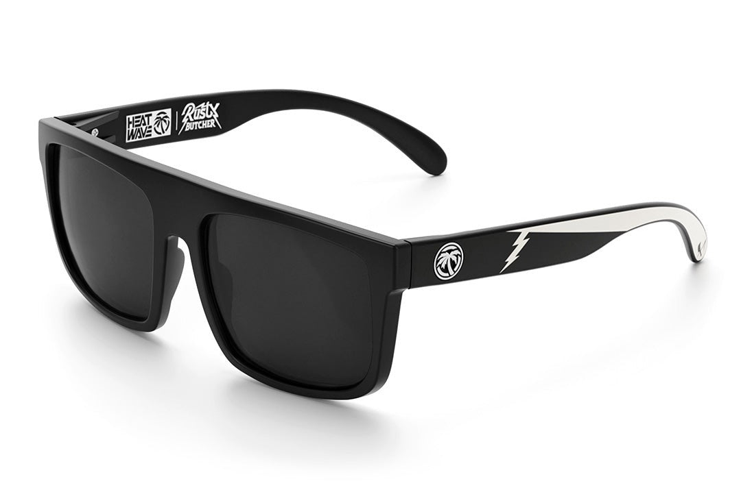 Heat Wave Visual Regulator Sunglasses with black frame, rusty butcher arms and black lenses.