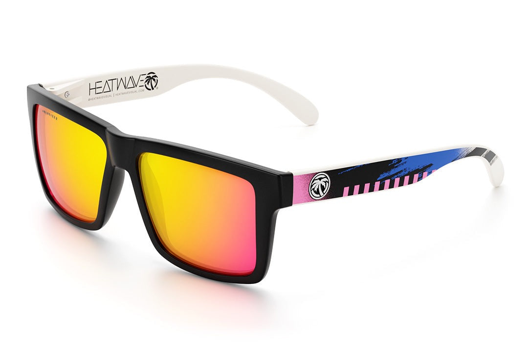 Heat Wave Visual Vise Sunglasses with black frame, pink blue white print arms and tropic polarized pink yellow len