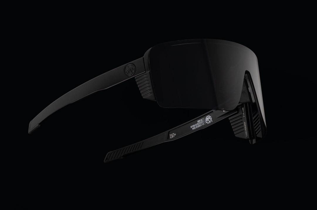 Side angle shot of the Skynet Sunglasses: Black Z87+ on a black background