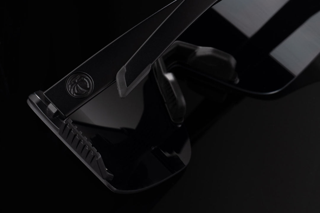 Close up shot of the Skynet Sunglasses: Black Z87+ on a black background
