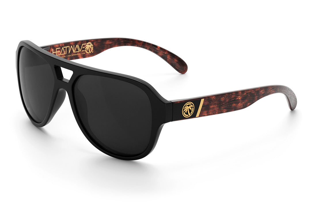 Heat Wave Visual Supercat Sunglasses with black frame, brown woodgrain print arms and black lenses.