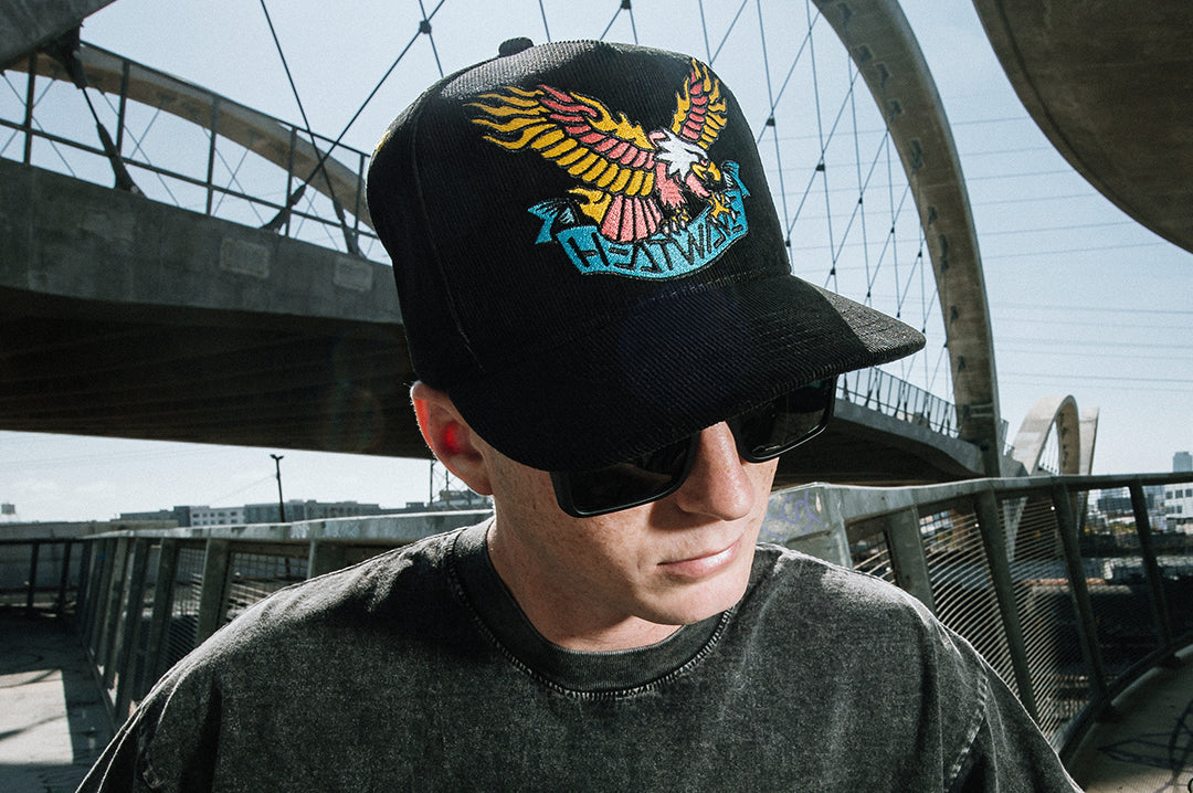 Man wearing the Heat Wave x Tall Boy Eagle Cord Hat - Black