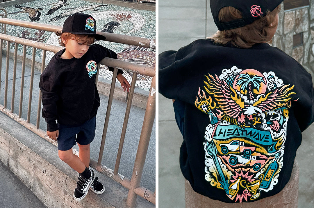 Boy wearing the Heat Wave x Tall Boy Flash Youth Crewneck Sweatshirt - Black showing the front and backside