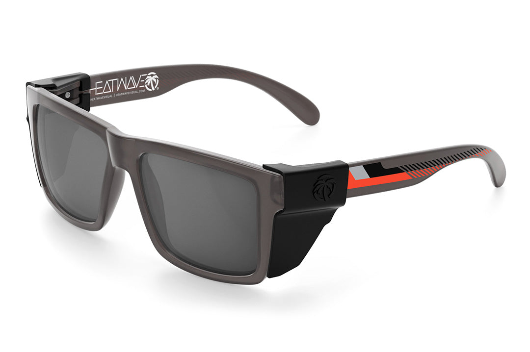 Heat Wave Visual Vise Z87 Sunglasses with frosted smoke frame, ring arm print, silver lenses and black side shields.