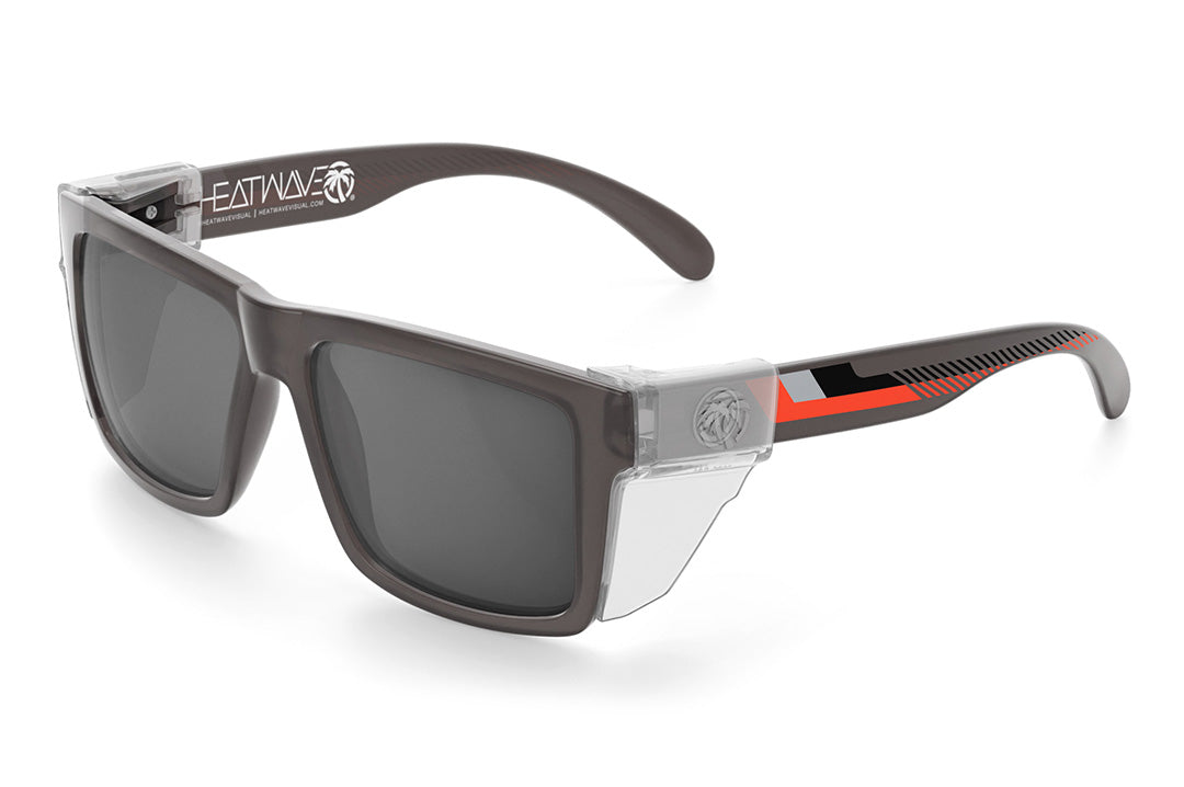 Heat Wave Visual Vise Z87 Sunglasses with frosted smoke frame, ring arm print, silver lenses and clear side shields.