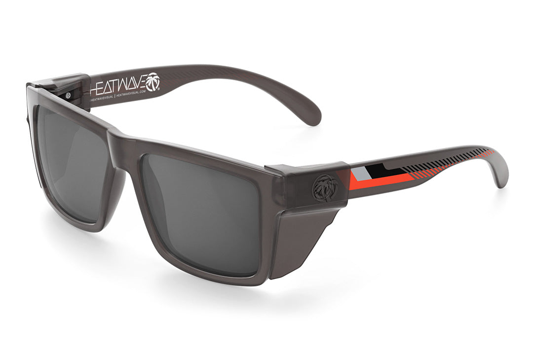 Heat Wave Visual Vise Z87 Sunglasses with frosted smoke frame, ring arm print, silver lenses and smoke side shields. 