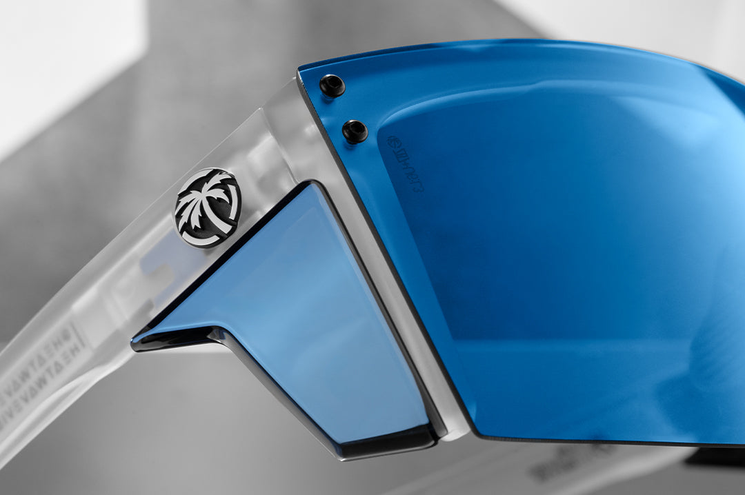 Close up side profile shot of the Performance Lazer Face Sunglasses: Vapor Frost Frame Coastal Lens Z87+ with blue side shields.