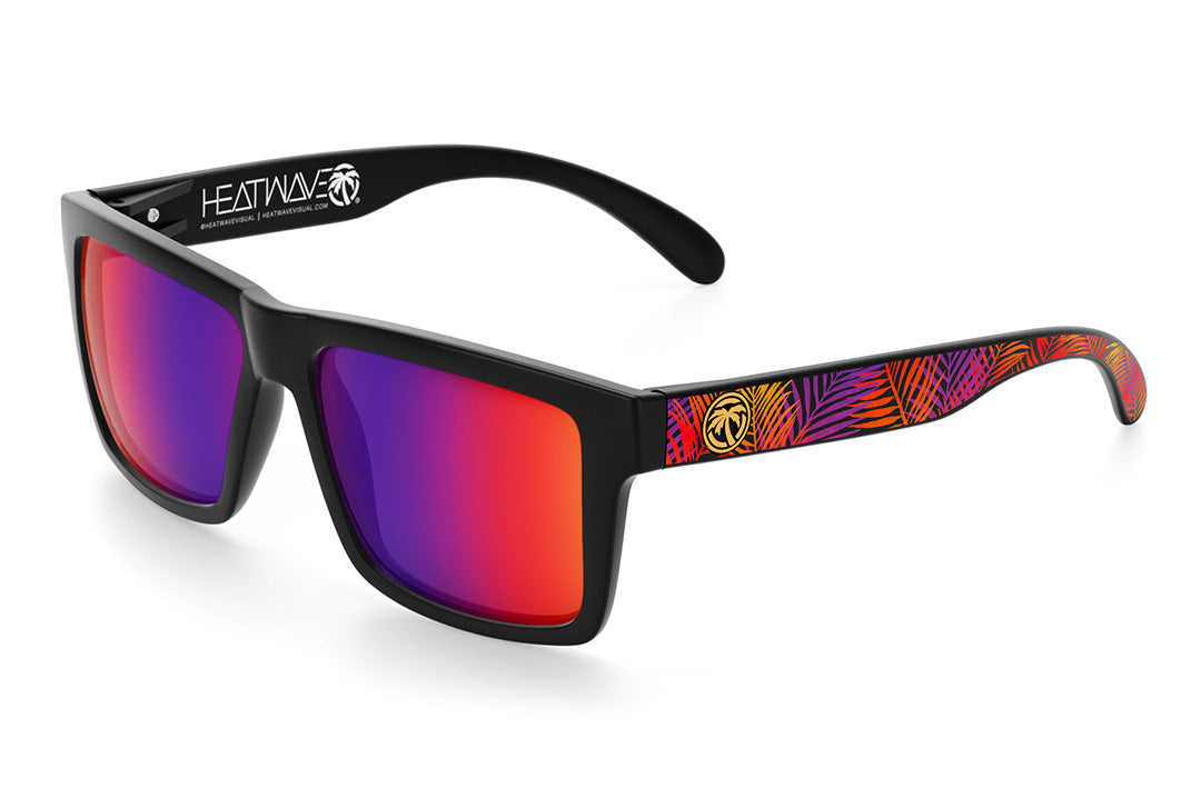 Heat Wave Visual Vise Sunglasses with black frame, neon palm print arms and atmosphere blue red lenses.