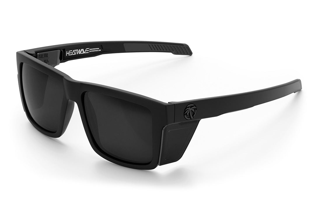 Heat Wave Visual Performance Vise Sunglasses with black frame, black lenses and black side shields. 