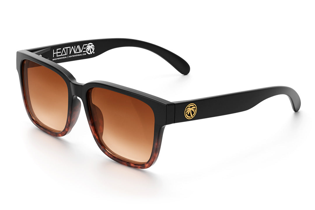 Heat Wave Visual Apollo Sunglasses with black and tortoise brown frame and brown gradient lenses.