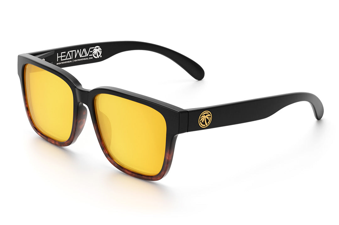 Heat Wave Visual Apollo Sunglasses with black and tortoise brown frame and gold lenses.