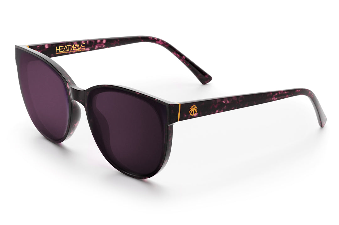 Heat Wave Visual Women's Carat Sunglasses with velvet tortoise frame and purple lenses.