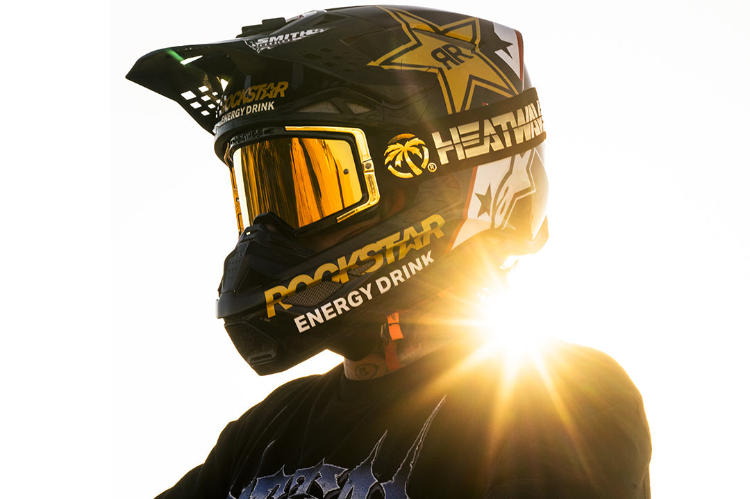 Colby Raha rocking the Heat Wave Visual MXG 250 Motorsport Goggles in the Colby Raha black/gold color with gold rush lens.