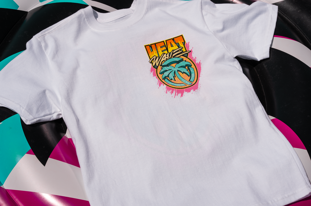 Lying on a pool floaty is the Heat Wave Visual Intense White T-shirt.