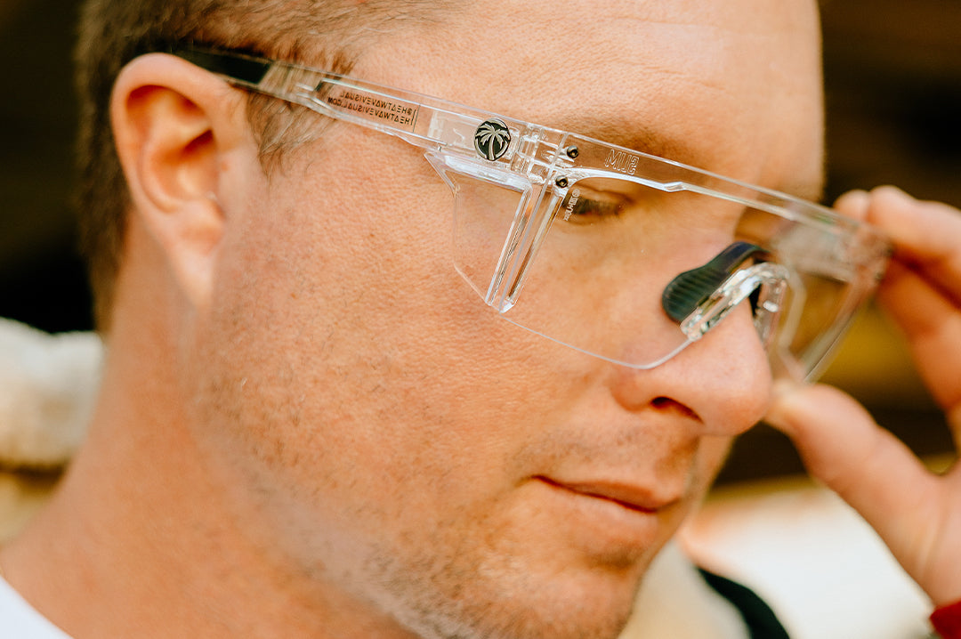 Close up of a man wearing the clear anti fog Heat Wave Performance Lazer Slim safety glasses