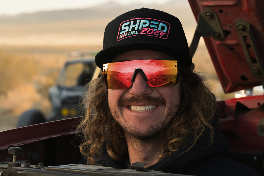 Blake Wilkey wearing the Heat Wave Visual Performance Lazer SLIM Sunglasses with firestorm red lens.