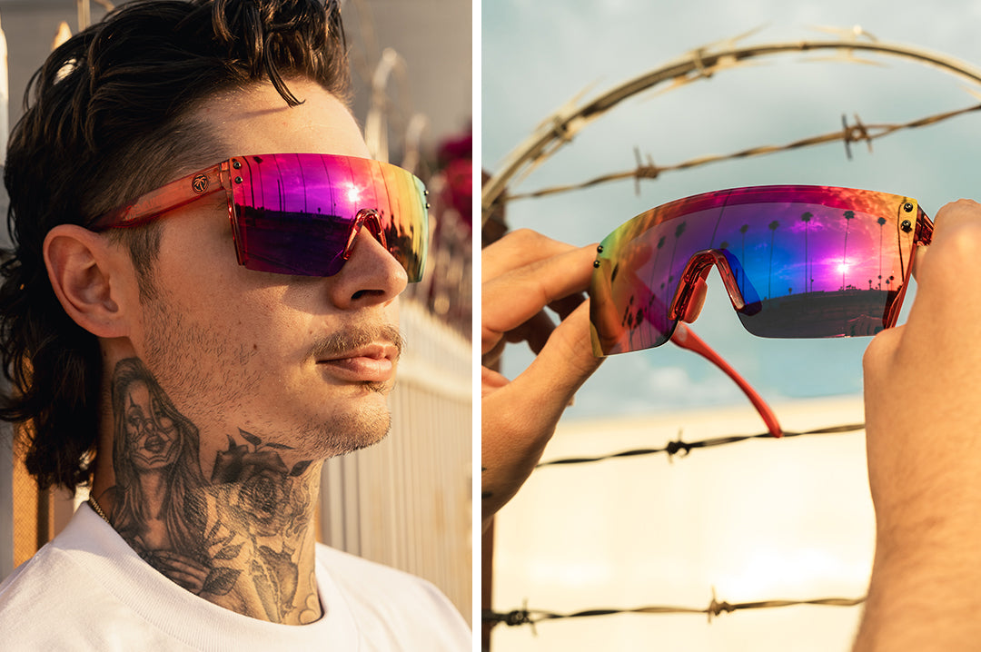 Biker rocking the Heat Wave Visual Lazer Face Sunglasses with neon red frame and atmosphere blue red lens.