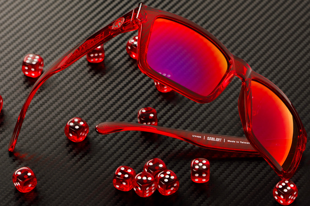 Side view of the Heat Wave Visual Z87 Vise Sunglasses with neon red frame and atmosphere blue red lenses.