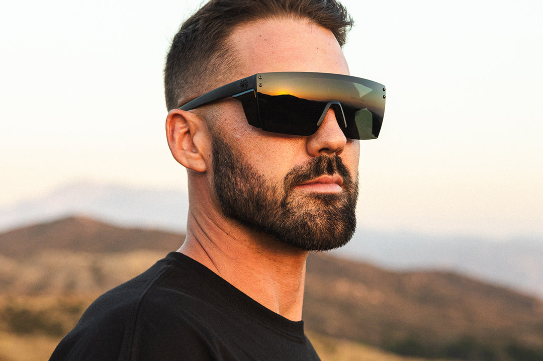 Dude rocking the Heat Wave Visual Performance XL Lazer Face Ultra Black Sunglasses.