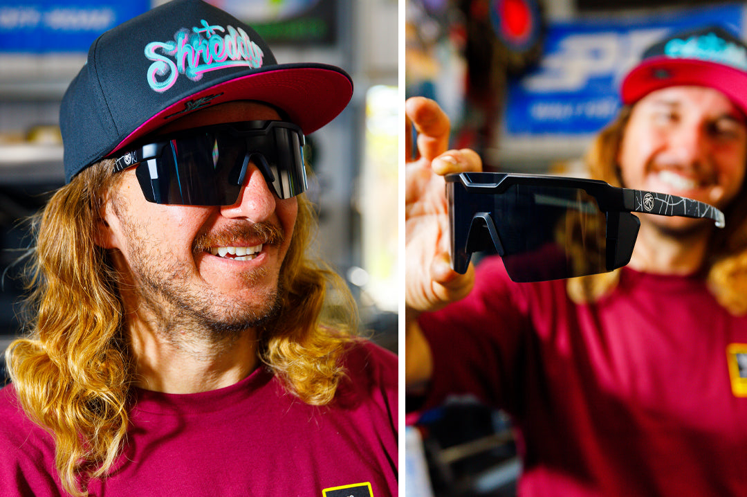 Blake Wilkey rocking the Heat Wave Visual Future Tech Sunglasses with black frame, shreddy print arms and black lens. 