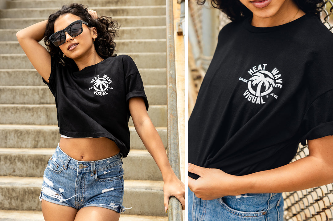 Young women wearing the Heat Wave Visual Standard Issue Ladies Crop Top T-shirt.