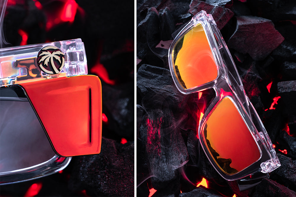 Close up of Heat Wave Performance XL Vise Vapor Clear Sunblast safety sunglasses with orange red side shields and hot bbq coals behind them.