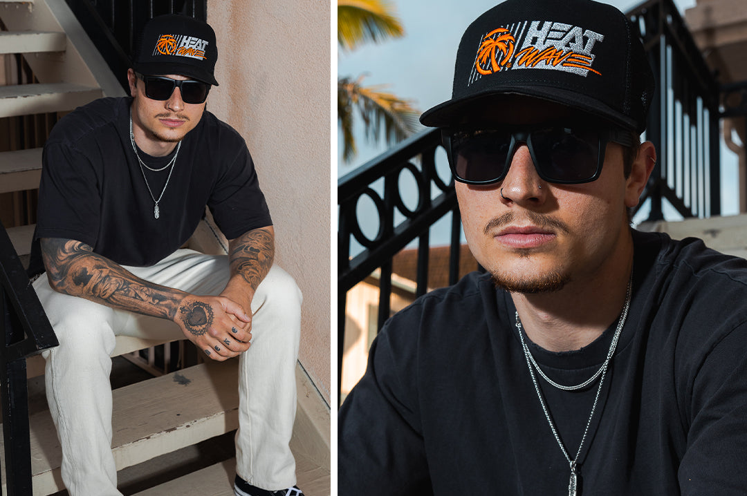 Gentleman rocking the Heat Wave Visual Z87 Vise Sunglasses with black frame and black lenses.