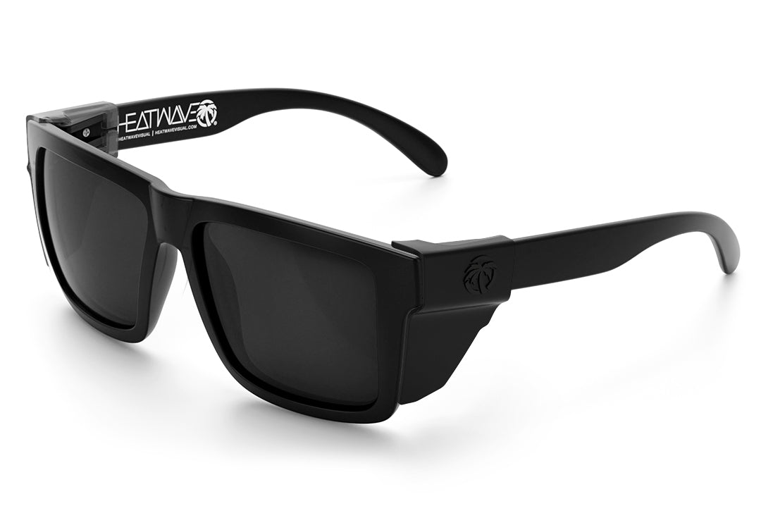3/4 angle of the XL VISE Z87 Sunglasses - GOLD EMBLEM: Black Lens on a white background with black side shields