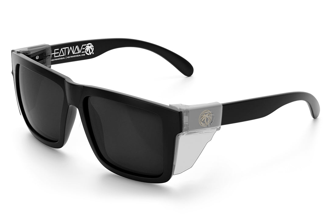 3/4 angle of the XL VISE Z87 Sunglasses - GOLD EMBLEM: Black Lens on a white background with clear side shields