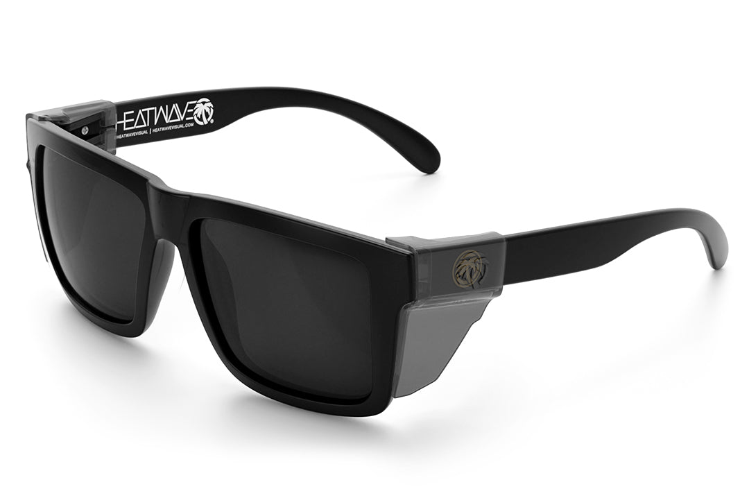 3/4 angle of the XL VISE Z87 Sunglasses - GOLD EMBLEM: Black Lens on a white background with smoke side shields