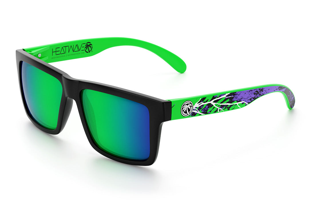 Heat Wave Visual Vise Sunglasses with black frame, Green and purple print arms and piff green lenses.