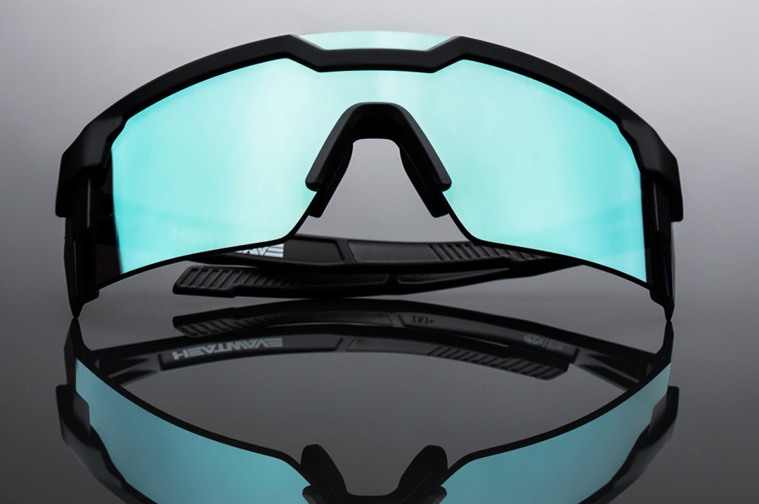 Front of Heat Wave Visual Future Tech Sunglasses with black frame and arctic chrome light blue lens.