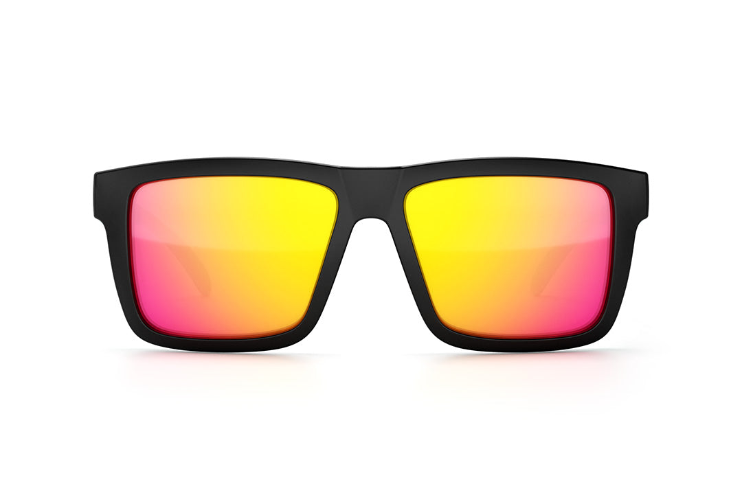 Front view of Heat Wave Visual XL Vise Sunglasses with black frame, aqua splash print arms and tropic pink yellow lenses.